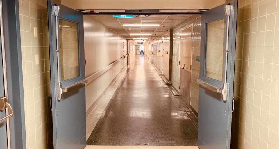 white and red exit sign